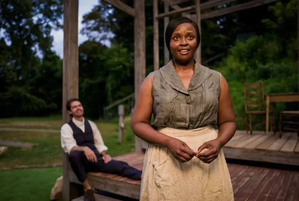 Actors standing on an outdoor stage